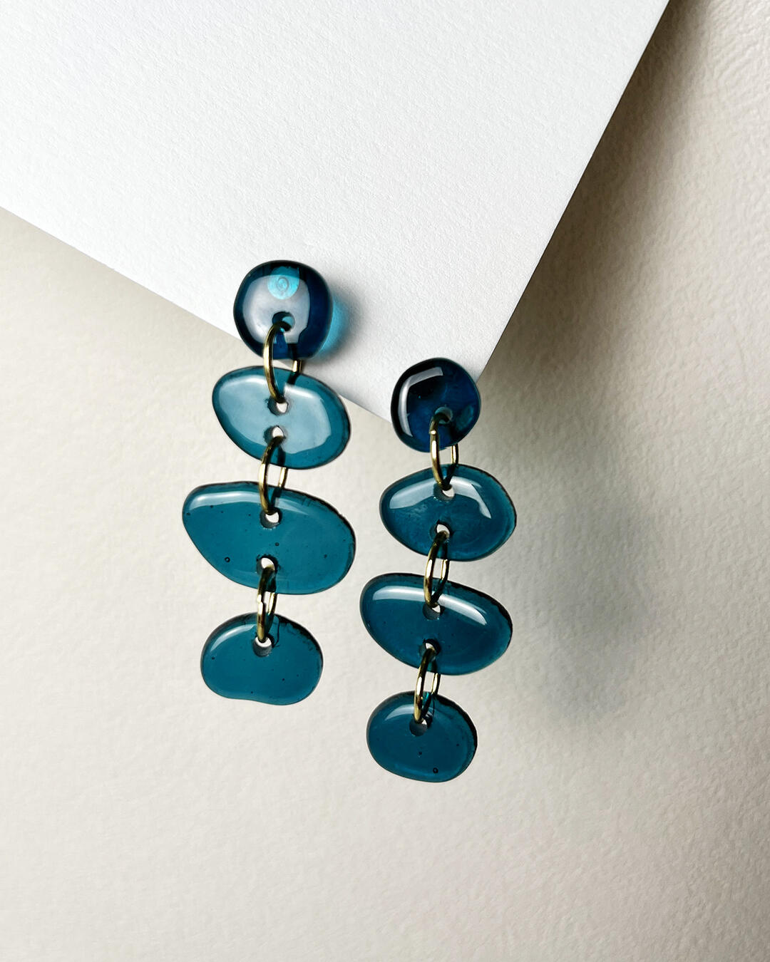 Kiln-formed glass jewelry created by Atlanta artist Sarah Noble